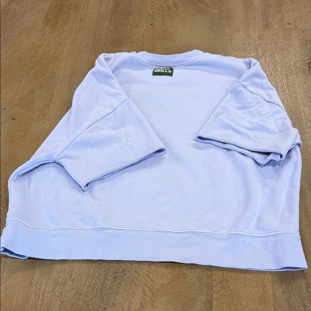 Daily Drills light purple short sleeve. Wink